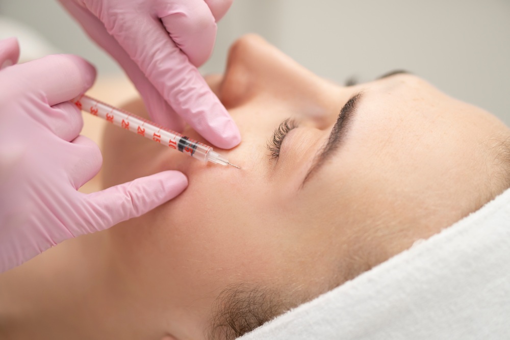 Injecting treatment into skin